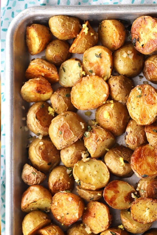 Garlic and Thyme Roasted Potatoes, crispy and chewy and bursting with flavor!