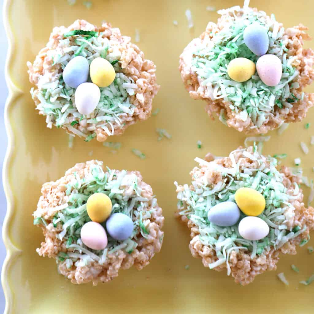 rice krispy treats easter, Rice Krispies treat decorated to look like a birds nest, with three chocolate eggs on top. rice krispies nests, cute easter no bake dessert. 