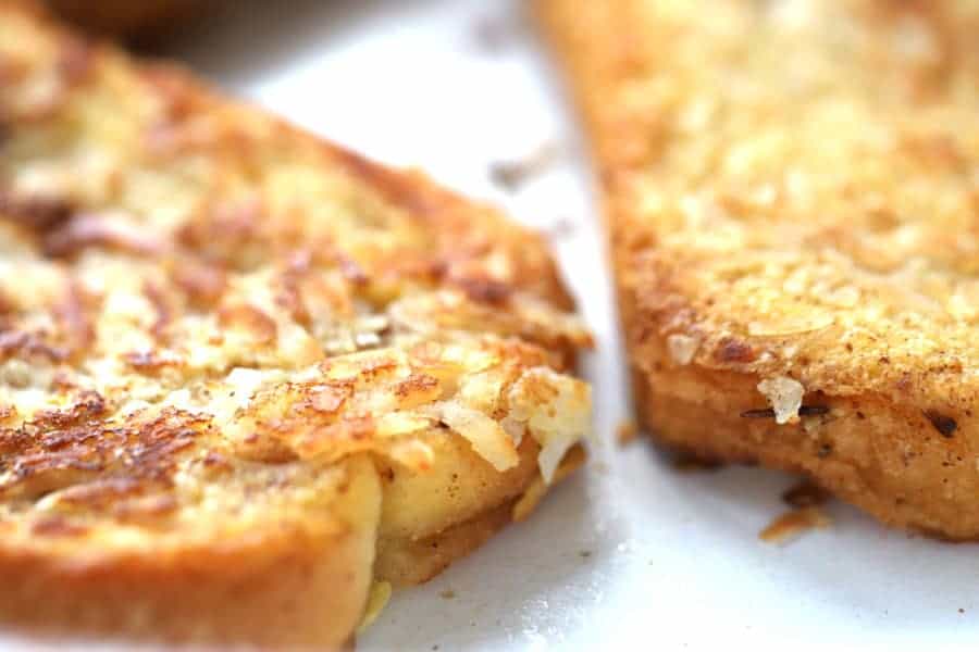 Coconut crusted french toast in frying pan