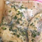 Cilantro Lime Chicken marinating with garlic, fresh cilantro, fresh lime juice, and spices. So much flavor packed into this incredible meal!