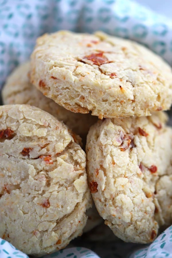 These delicious sun-dried tomato and parmesan biscuits are a tasty and flaky biscuit recipe. They're delicious savory biscuits that are easy to make.