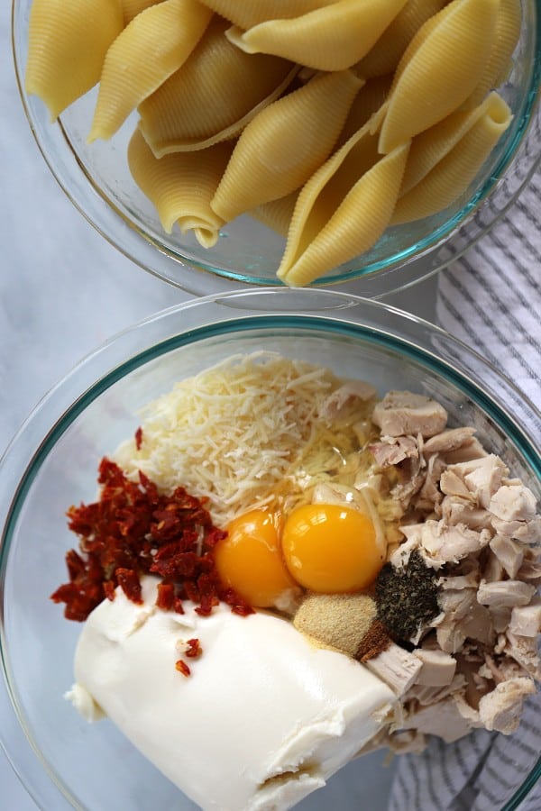 Ingredients in chicken stuffed pasta bake, ricotta stuffed shells, chicken alfredo shells, best stuffed shells recipe.