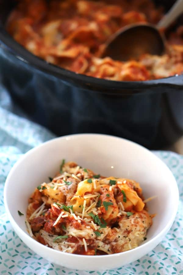 This is one of the easiest tortellini pasta recipes. Just dump the ingredients in and cook all day. So delicious! tortellini in crockpot, crockpot frozen tortellini. 