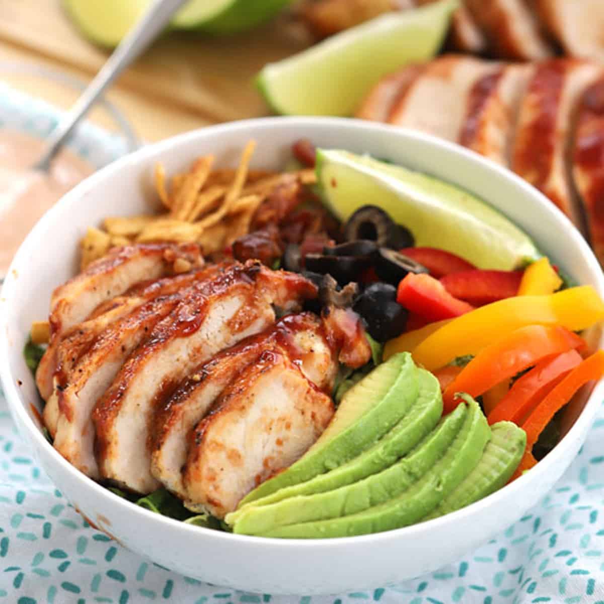 bbq chicken Salad ingredients are grilled chicken, loads of veggies and plenty of tangy BBQ ranch dressing