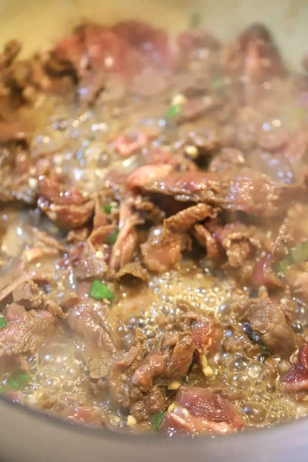 carne picada in a skillet, cooking for teriyaki stir fry, beef teriyaki stir fry, teriyaki beef stir fry. 
