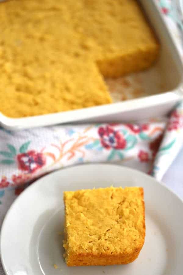 simple corn bread in a baking dish and on a small plate