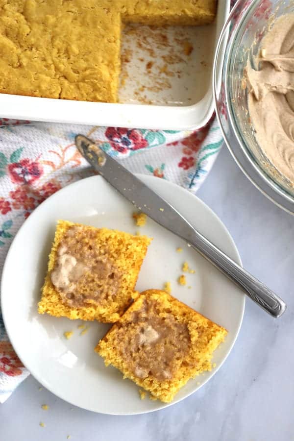 corn bread on a plate with texas roadhouse cinnamon honey butter recipe