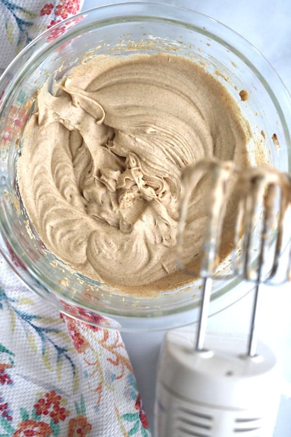 Homemade whipped cinnamon honey butter with an electric hand mixer