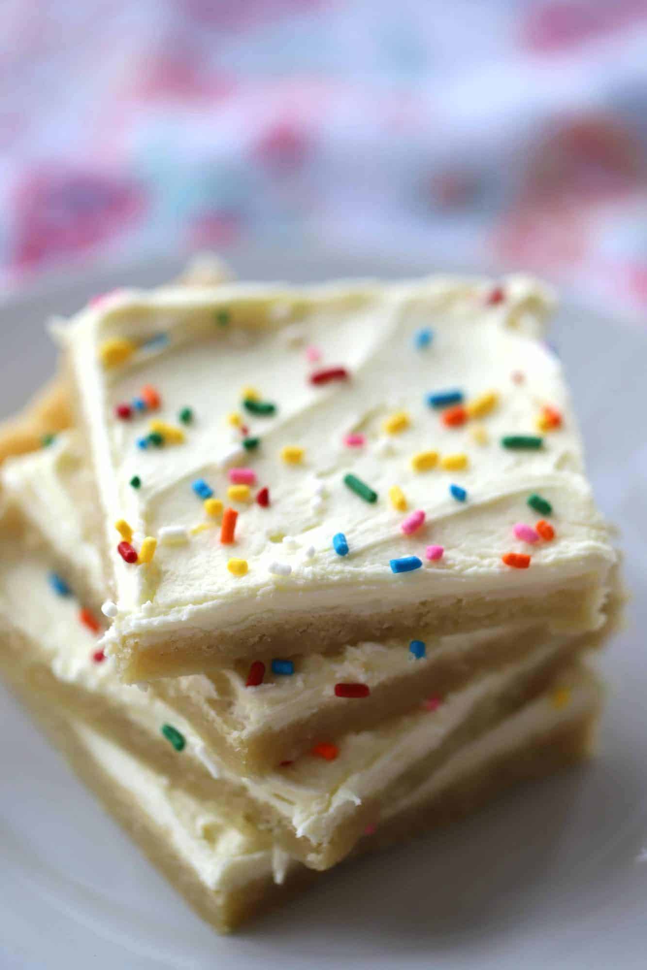 Lemon Sugar Cookie Bars with a creamy lemon frosting and sprinkles