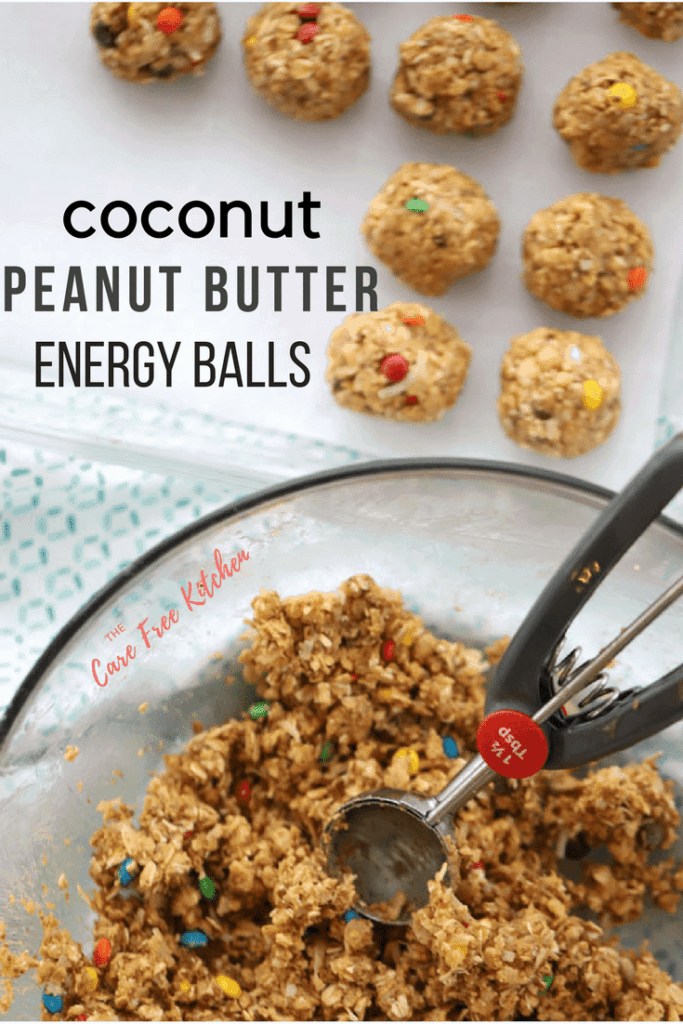 Energy ball mixture in a mixing bowl being scooped and lined up on a baking sheet. no bake snack recipe. 