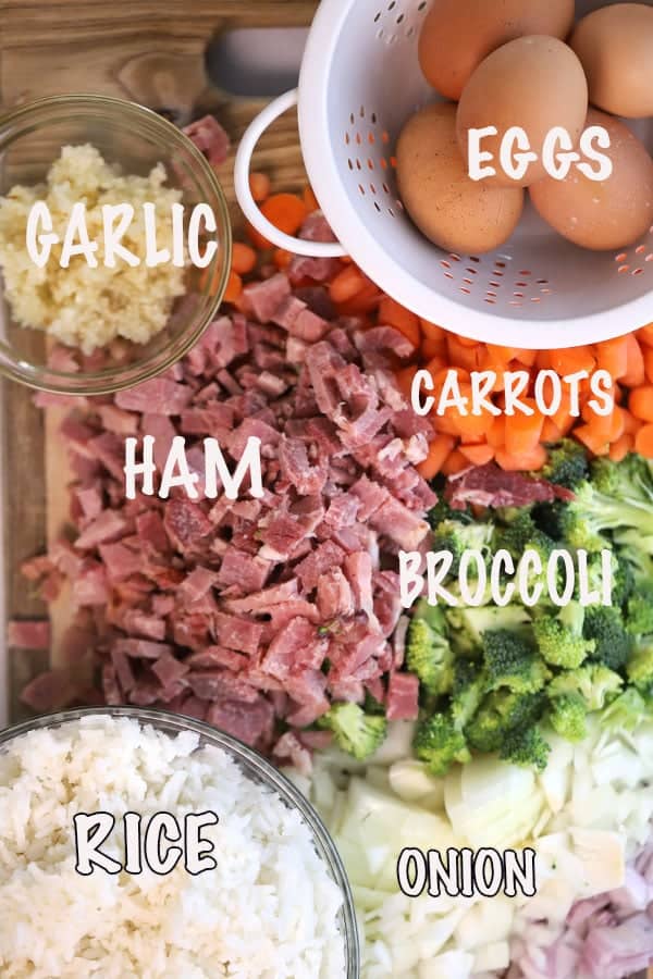 Ingredients for making this ham fried rice recipe out on a table, this stir fry ham with rice recipe is super simple and delicious.