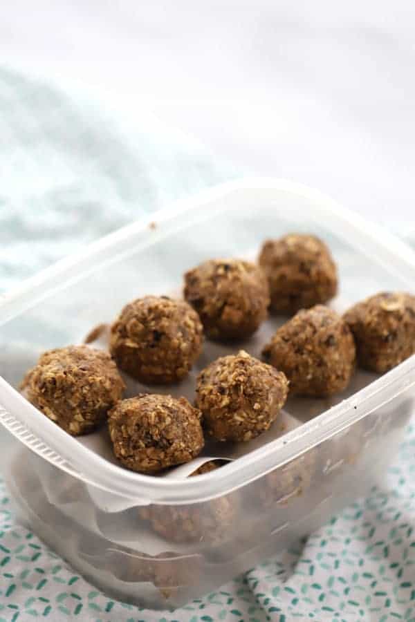 Energy balls in a plastic tupperware container. no bake snacks idea. oatmeal energy balls. 