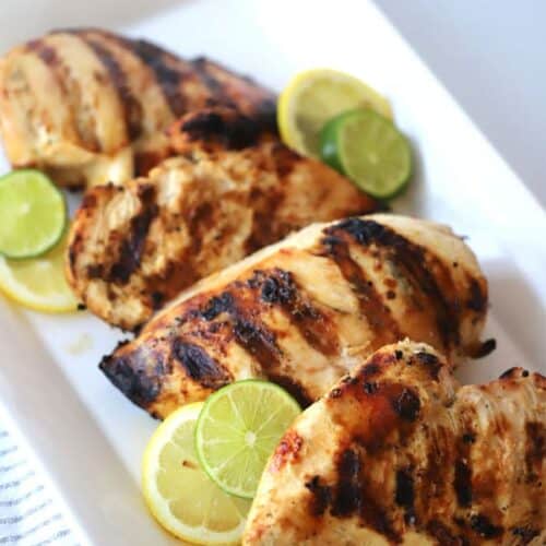 This 2 citrus chicken marinade is divine! There's tons of flavor and the chicken is so moist. It's the perfect marinade for any grill night!
