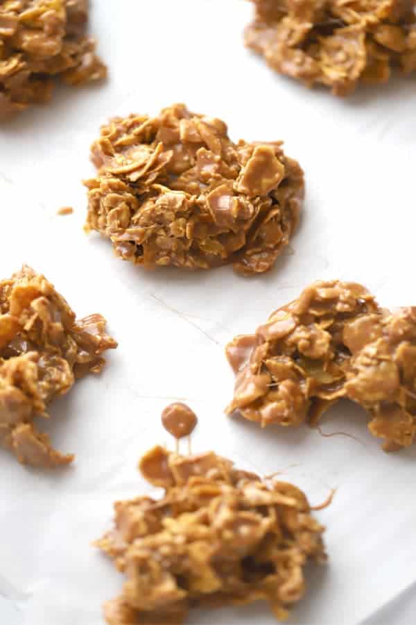 One of the best cookie recipes with nutella, nutella cornflake cookies on a white surface, cooling; simple cornflake dessert.