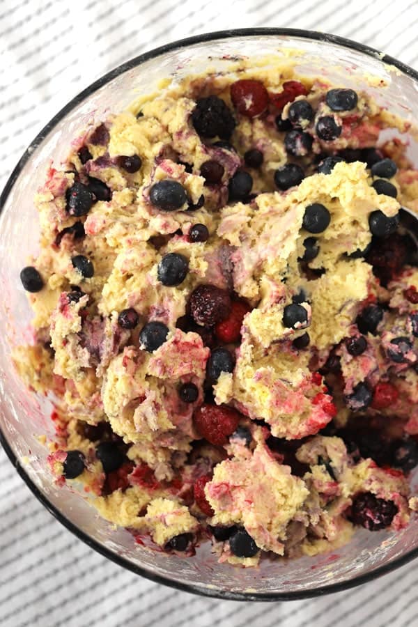 These triple berry muffins are made with greek yogurt and a sugar crusted top.