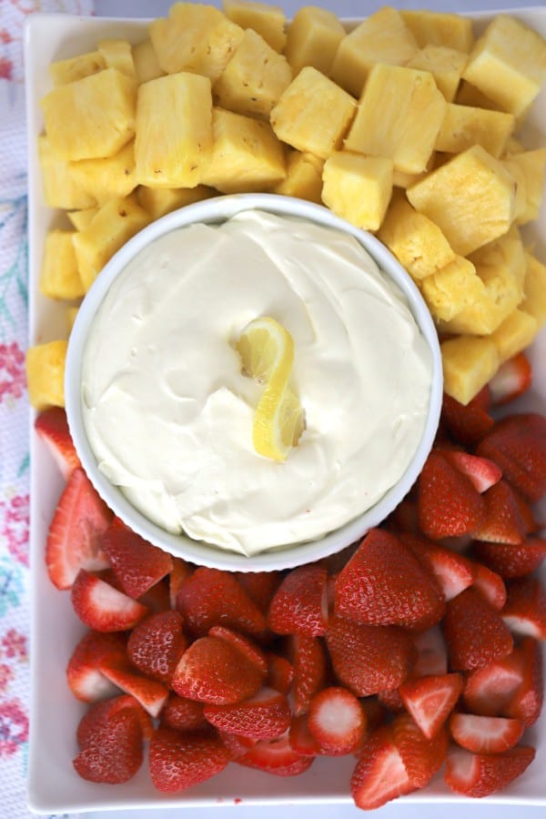 how to make Lemon Cheesecake fruit dip. Fruit dip with pineapple and strawberries on a platter
