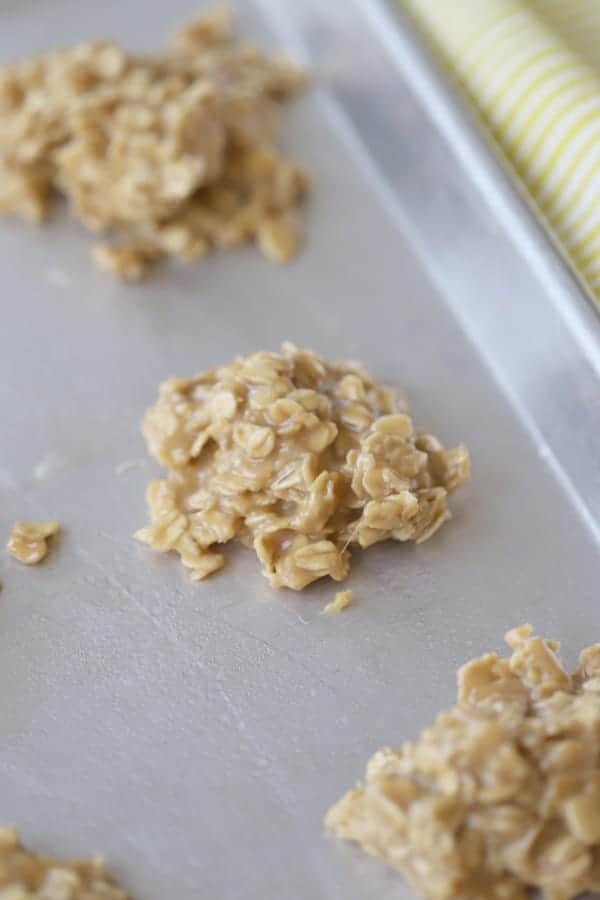 Peanut butter no-bake cookies on a sheet tray.