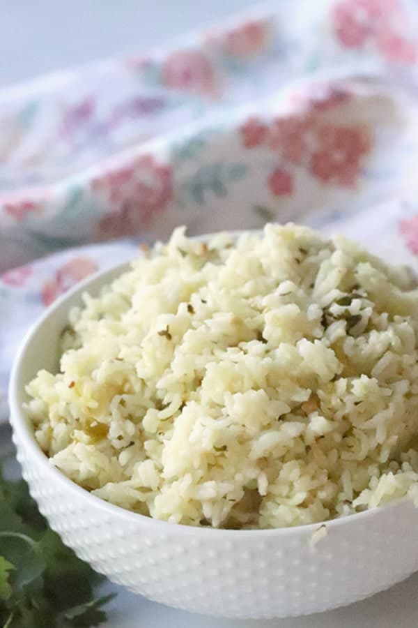 cilantro lime rice in a white bowl.