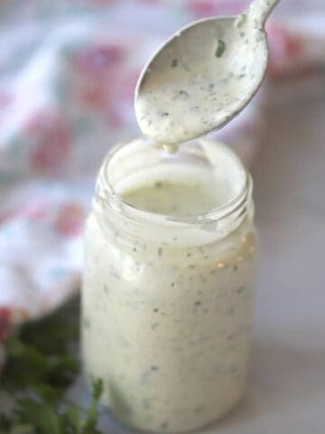 This Salsa Ranch Dressing Recipe is perfect for salads, quesadillas, or as a dip for chicken fingers.Â  Included is also an easy ranch dressing recipe.Â  This will soon become your go-to, how to make home-made ranch dressing, recipe.Â 