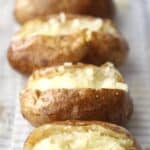 baked, baked potato in oven in a glass baking dish