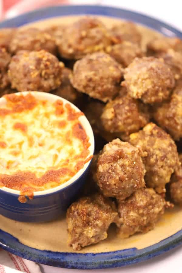 spicy italian meatnalls on a platter with marinara sauce