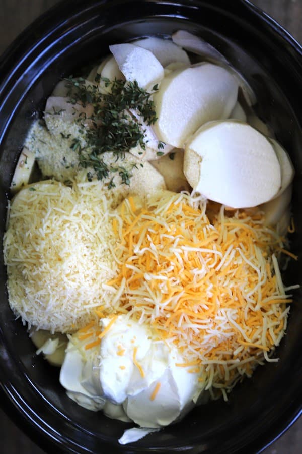 scalloped potato ingredients in a slow cooker, slow cooker scalloped potatoes recipe. 