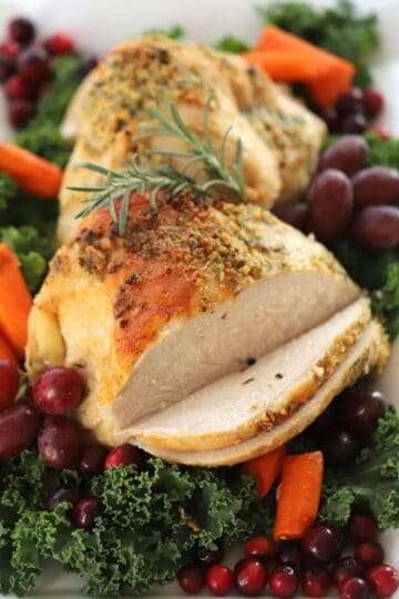 Turkey Breast Recipes, on a platter with fruit and garnish