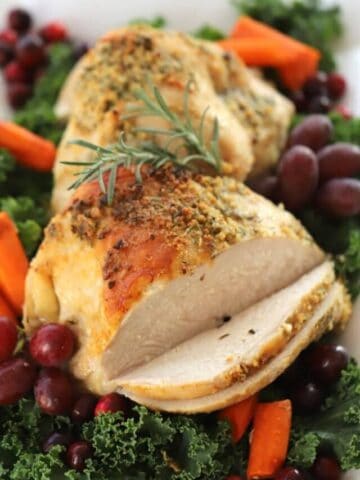 Turkey Breast Recipes, on a platter with fruit and garnish