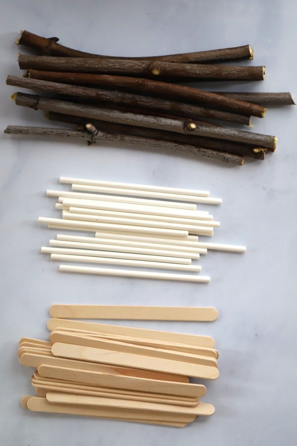 a variety of sticks for making caramel apples at home.