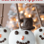 These adorable snowman caramel apples are the perfect winter baking project. They have a thick, smooth caramel layer, covered in melted white chocolate wafers and have an adorable top hat and cute snowman face.