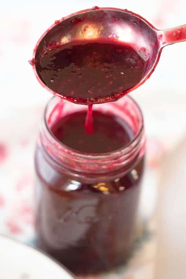mixed berry syrup recipe in a jar