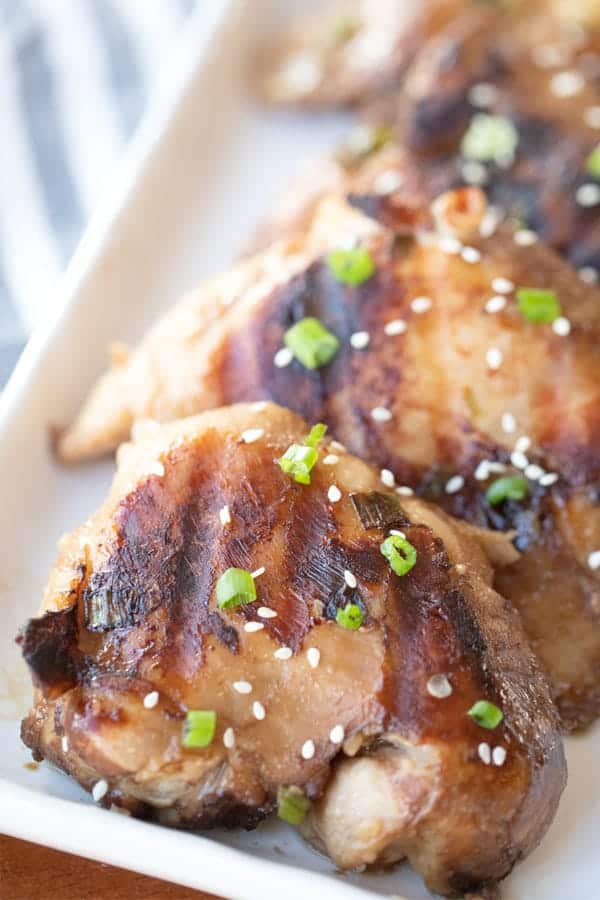 how to grill teriyaki chicken recipe on a white platter, grilled teriyaki chicken recipes. teriyaki chicken bbq. 