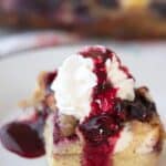 This is an easy mixed berry overnight French toast bake.  It’s made with simple ingredients, frozen mixed berries, milk, cream cheese, and eggs.  It’s a delicious overnight French toast casserole with streusel topping.
