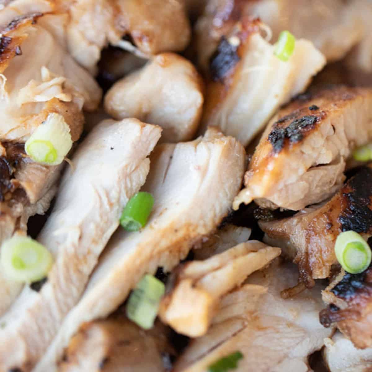 grilled teriyaki chicken recipe cooked and cut into strips, ready to eat