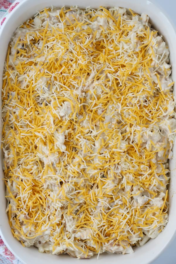 un-cooked cheesy potatoes hash browns, potato casserole with cheese, cheesy potato bake, easy cheesy potato recipe.