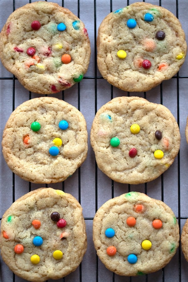 chocolate m&m cookies on a cooking rack