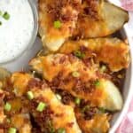 loaded baked potato skins reicipe with cheese and bacon, easy baked potato skins recipe