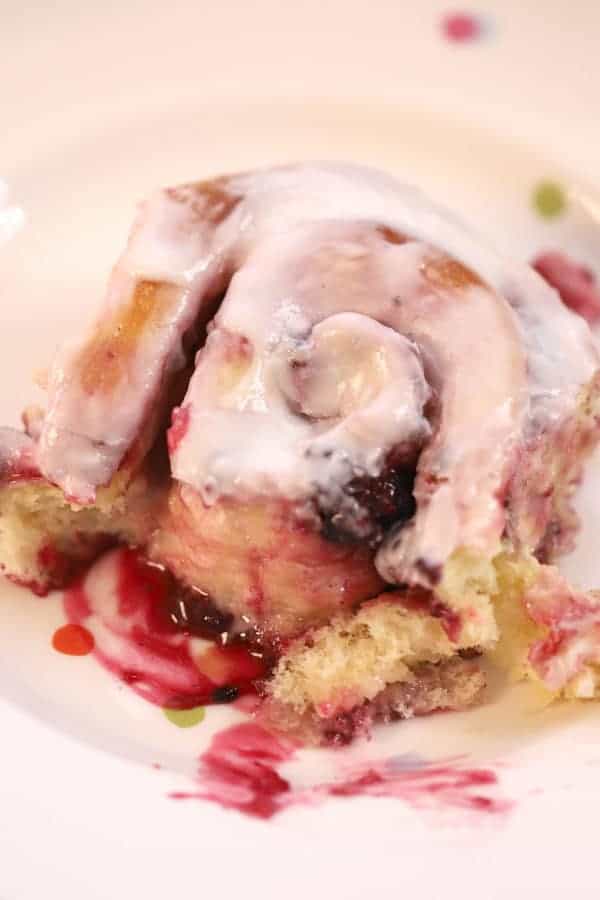 triple berry sweet roll with lemon icing