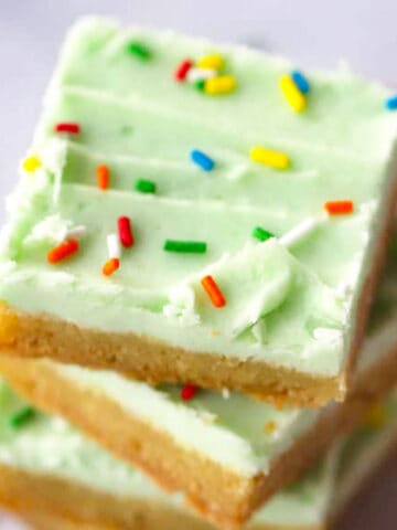 cookie bars with lime coconut buttercream frosting