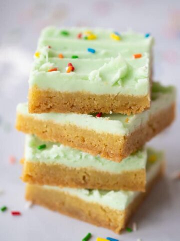 cookie bars with lime coconut buttercream frosting