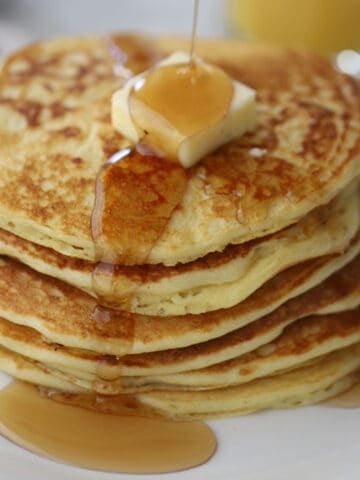 einkorn buttermilk pancakes with butter and syrup