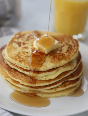 einkorn buttermilk pancakes with butter and syrup