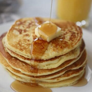 einkorn buttermilk pancakes with butter and syrup