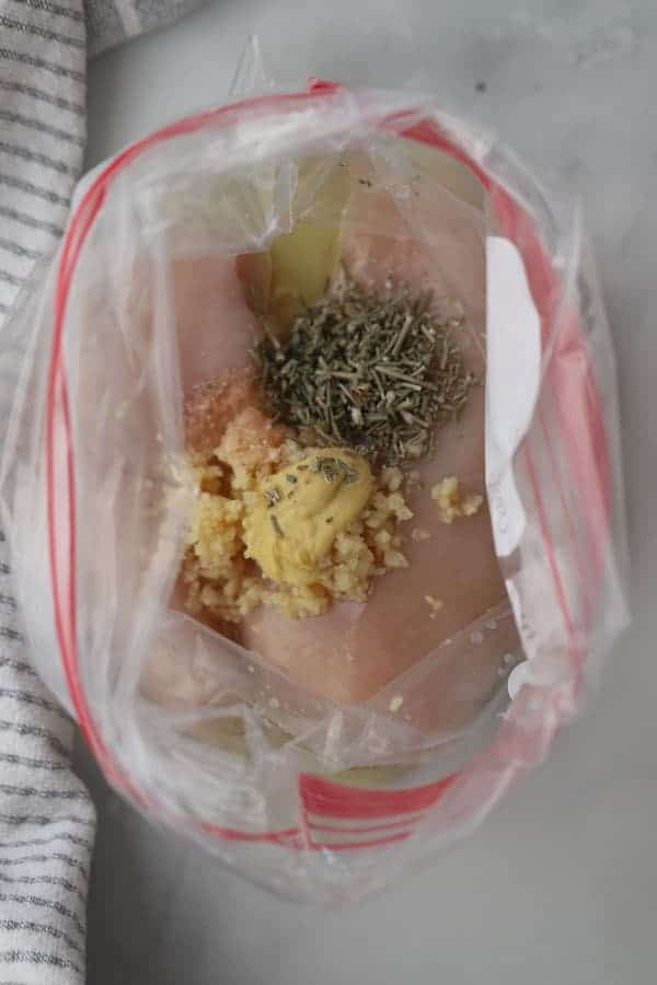 lemon rosemary chicken breast marinade in a ziplock bag