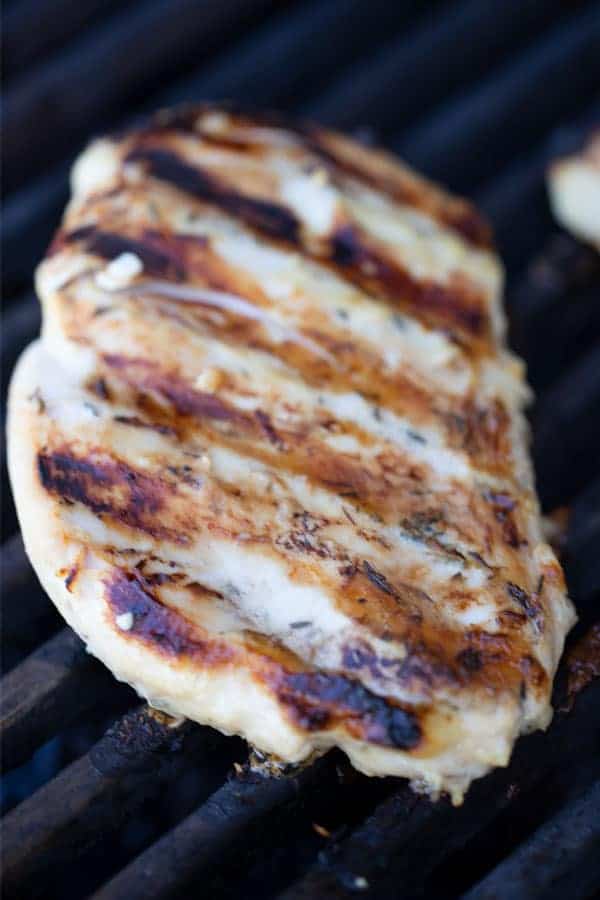 chicken breast on a grill