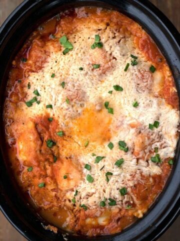 easy crockpot lasagna with ravioli in a slow cooker
