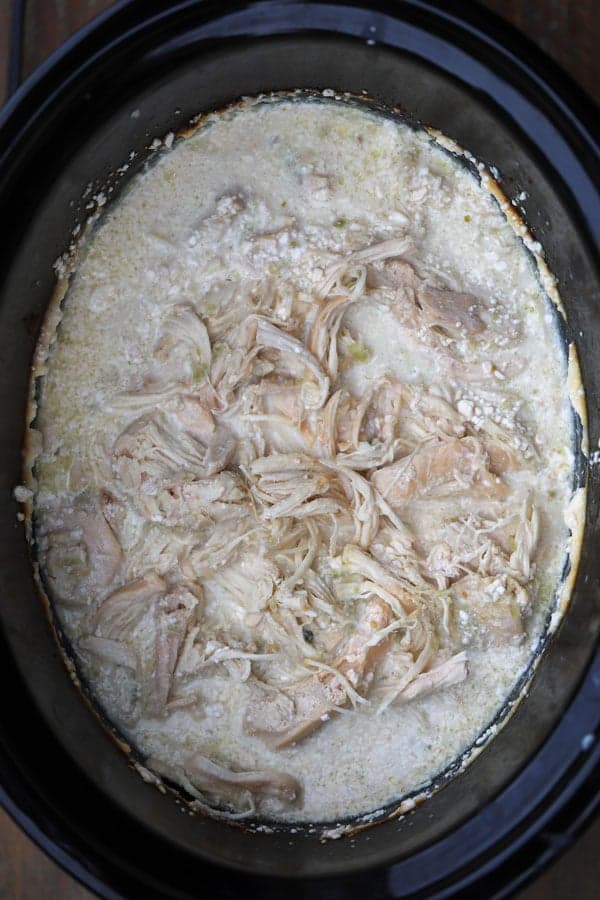 Crockpot Chicken Salsa Verde, shredded chicken in a crockpot