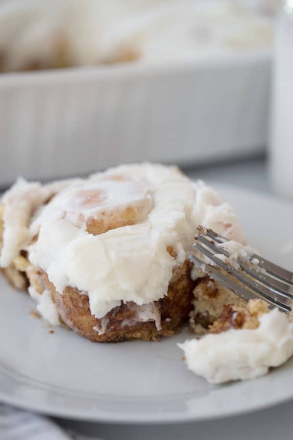 cinnamon roll on a white plate