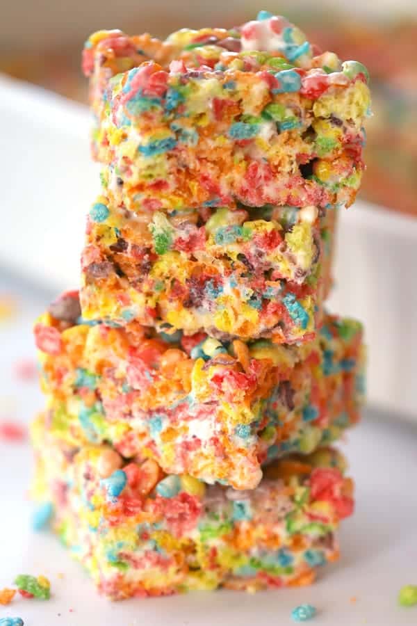 fruity pebbles rice rispy treats stacked on top of each other