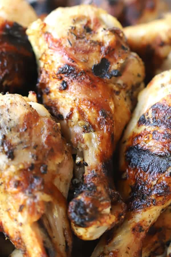grilled to golden perfection, Garlic and Herb Chicken Drumstick Recipe, grilled chicken drumsticks marinade, garlic chicken drumsticks, chicken thigh recipes. 